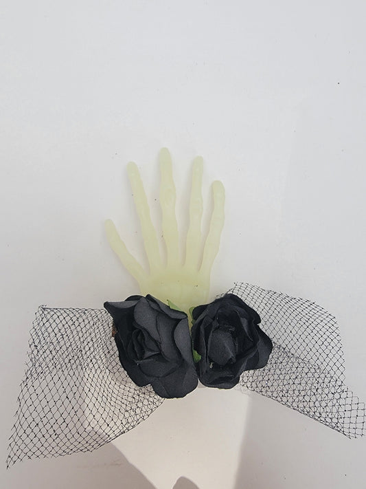 Spooky glow in dark hair clip with black flowers