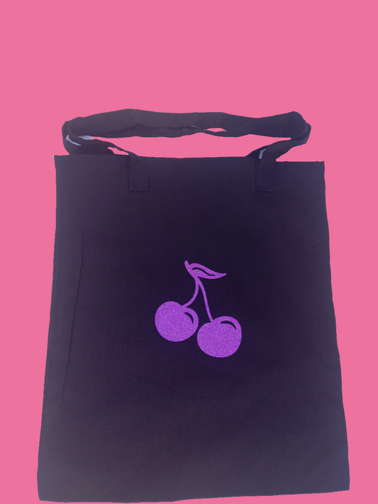 Black tote bag with purple glitter cherries